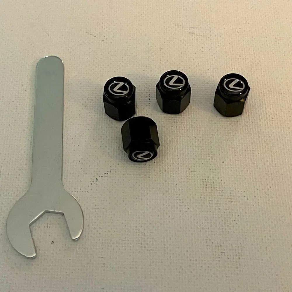 Lexus logo valve Stem caps in Black set of 4 with Logo NWT